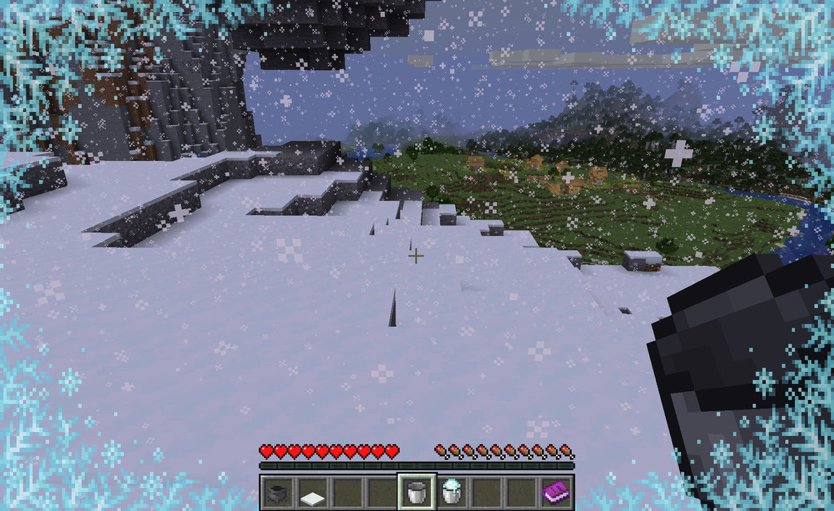 Minecraft powder snow covering a snowy mountainside during gameplay