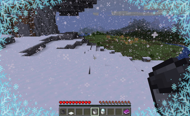 Minecraft powder snow covering a snowy mountainside during gameplay